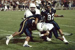 Aggies lose scoring fest 54-34