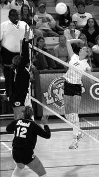 Aggie spikers outlast Vandals for first conference victory