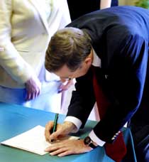 Pres. Hall signs constitution for first student chapter of natural resources club