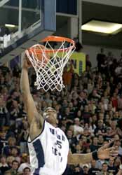 Ag basketball escapes in OT