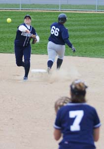 Softball swings for the fence