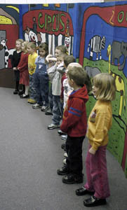 Kindergarten children create and perform their own opera