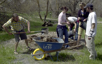 Earth Day attracts volunteers for planting trees in the park