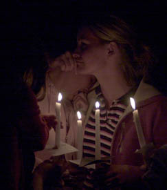 Hundreds gather to remember lives at candle-light vigil