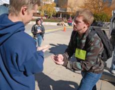 Students throwing rocks, playing with scissors