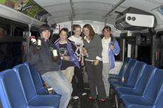 Students work to stuff buses this holiday season