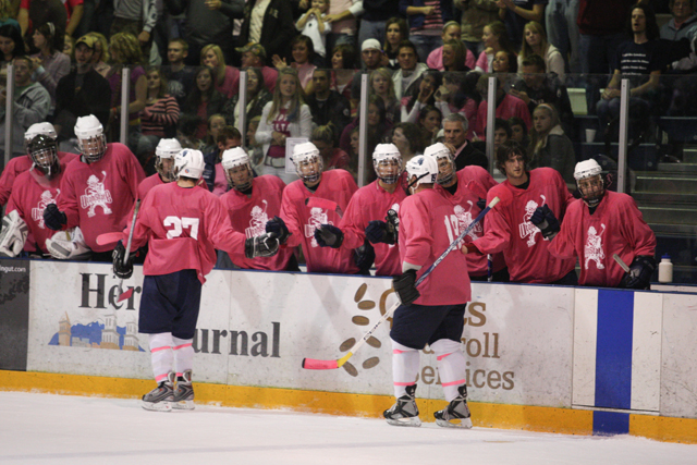 Men wear pink in support of cancer