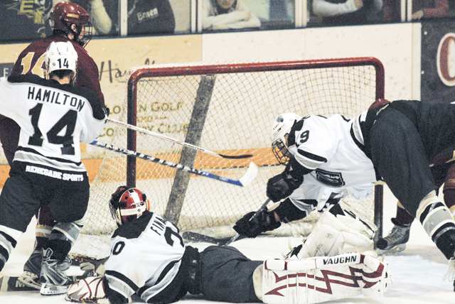 Loss at Denver ends Hockey season