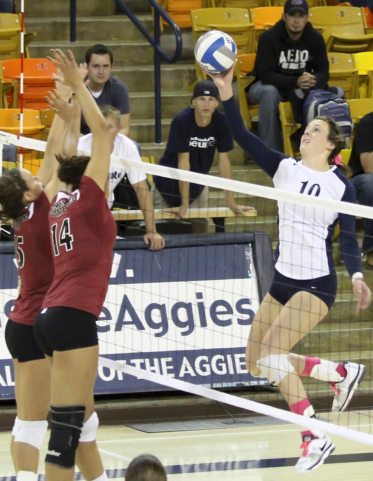 Volleyball bites Wolfpack in four sets