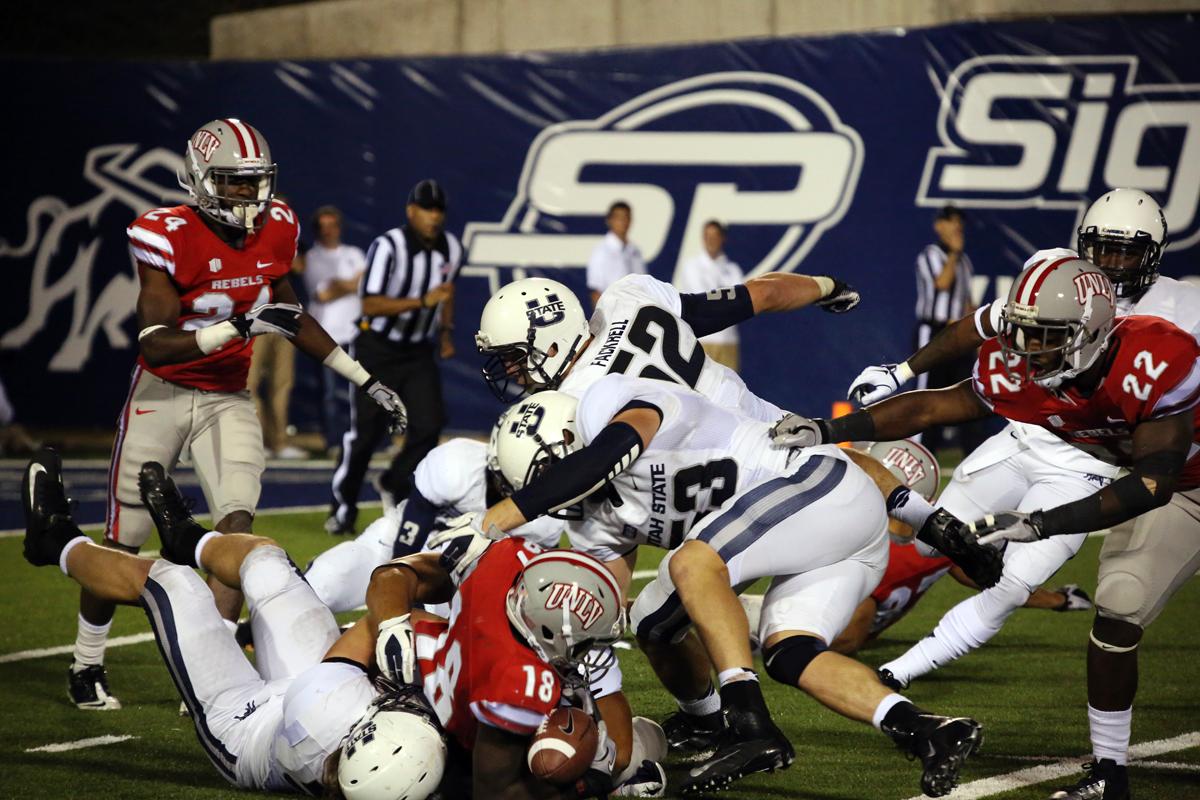 Football: Williams, Aggies Stomp Rebels - The Utah Statesman