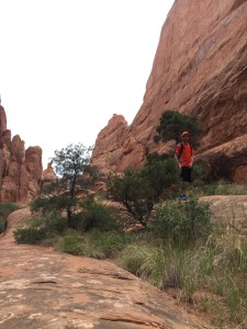 A hiker finds his way around the Fiery Furnace in Arches National Park 