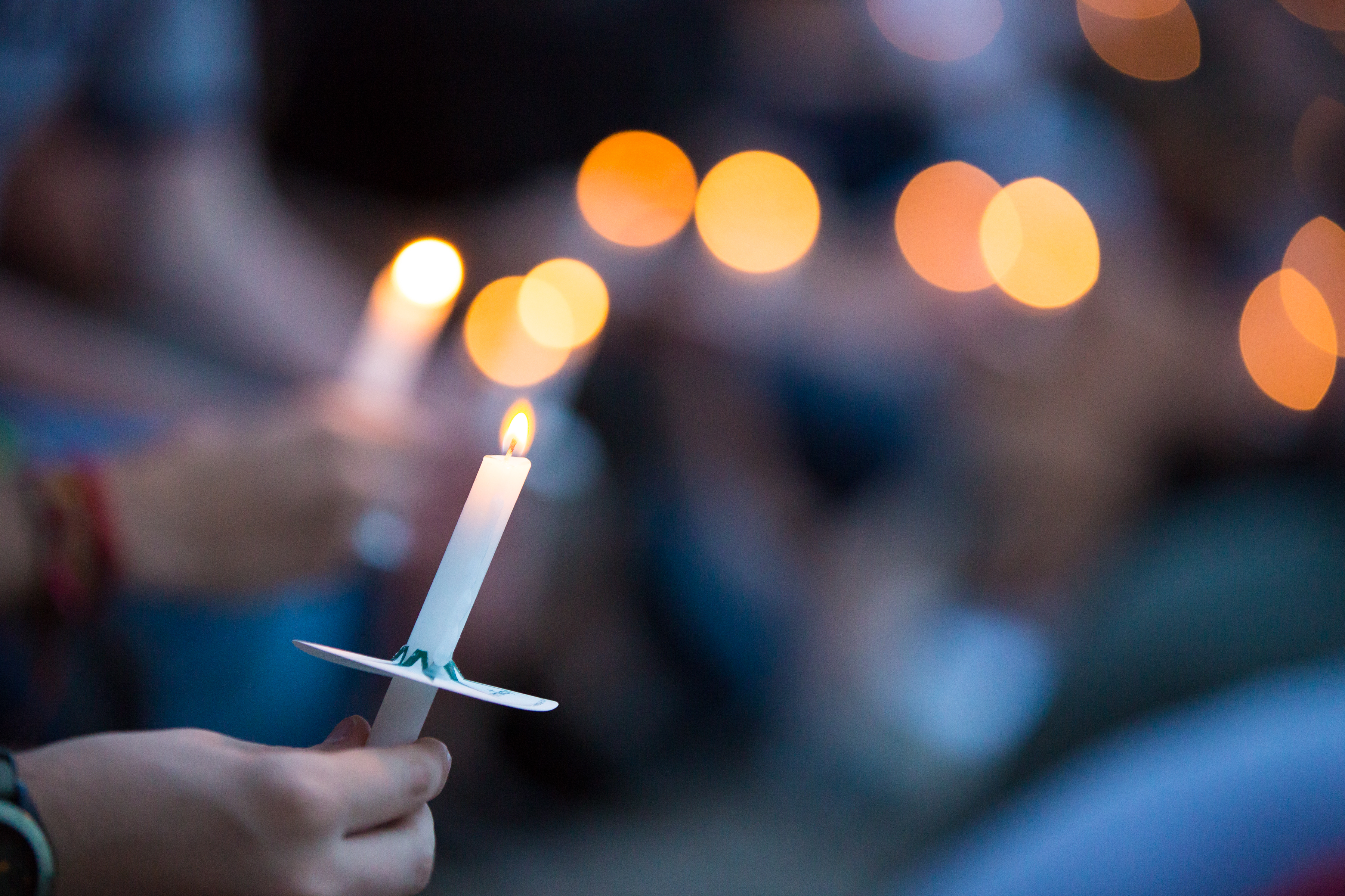 Students and professors each light candles to welcome the new school year at the Light on the Hill on August 30. (Photo by Matt Halton)