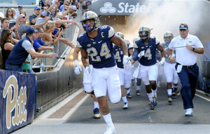 Pitt's James Conner (24) leads the team onto the field against Villanova at Heinz Field in Pittsburgh on Saturday, Sept. 3, 2016. Pitt won, 28-7. (Matt Freed/Pittsburgh Post-Gazette/TNS)