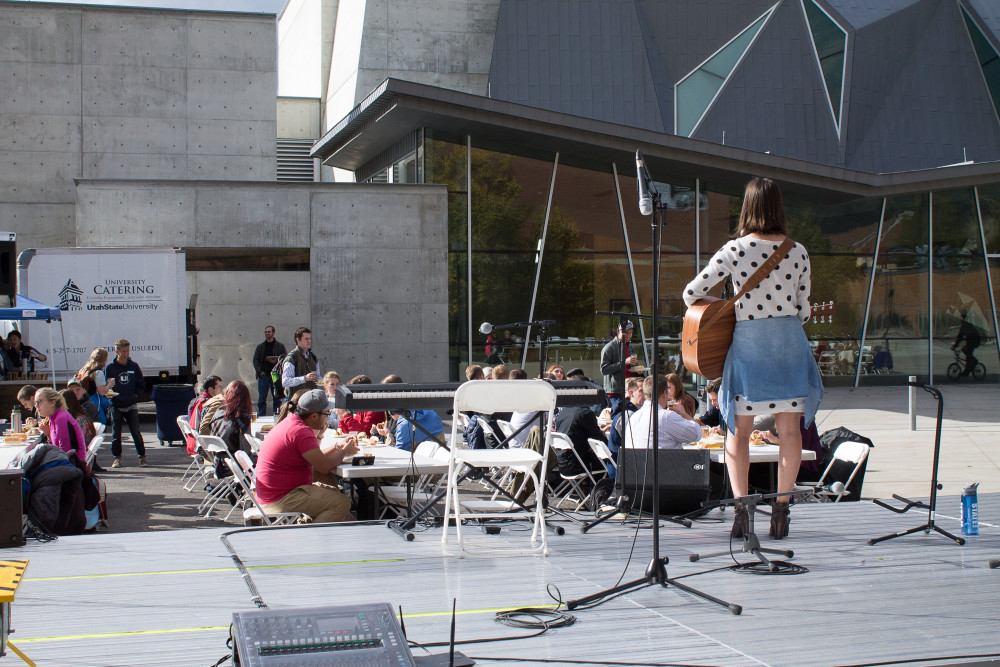 A USU student performs at the 2016 Artoberfest. Photo by Katie Hale