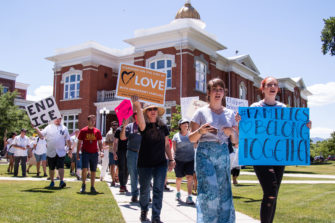 USU professors speak at Cache Valley’s ‘Families Belong Together’ rally