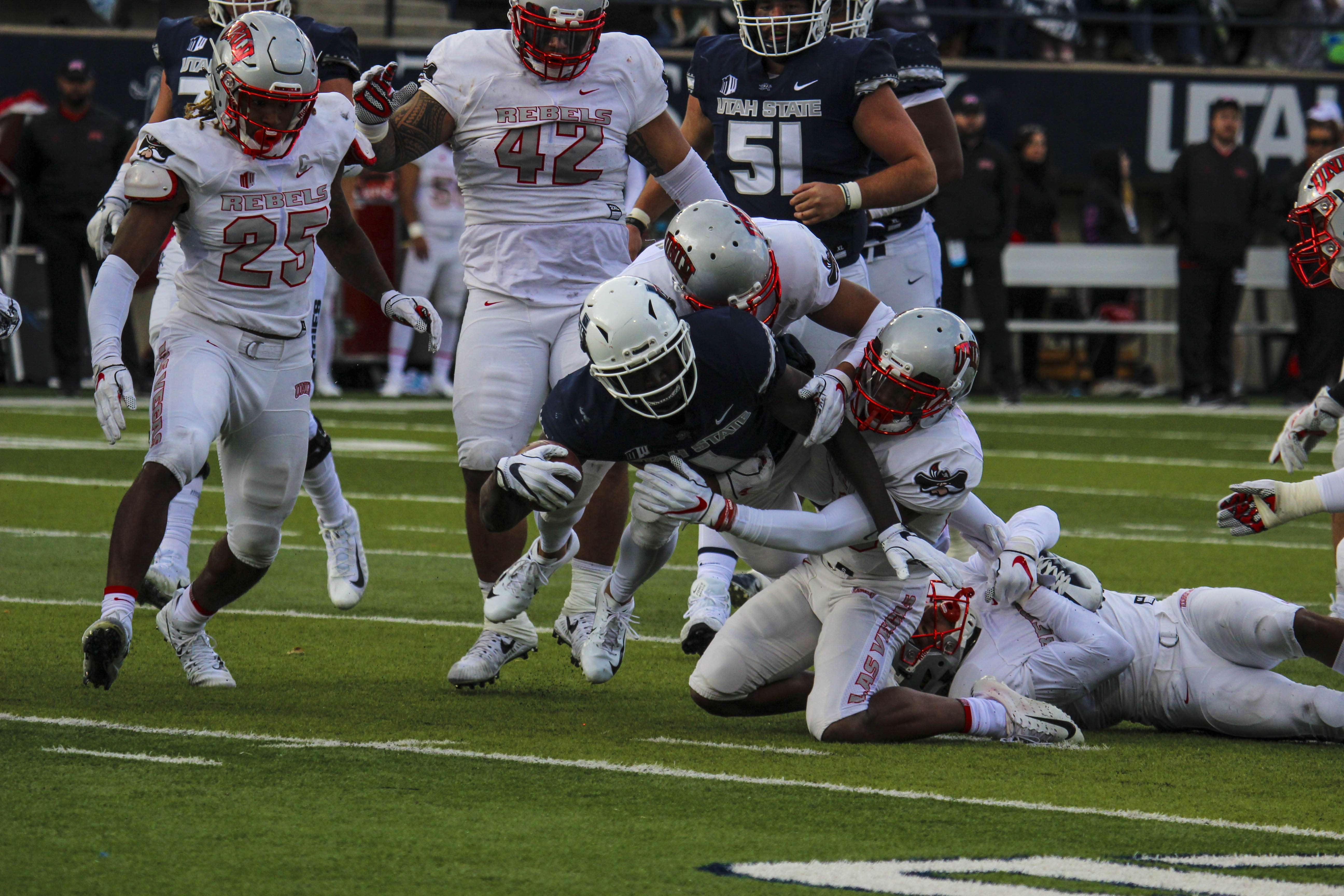 Domination Love throws 5 touchdowns to lead Utah State past