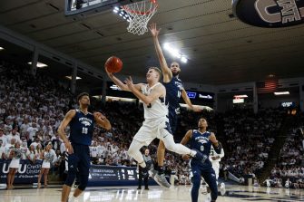 Utah State stuns 12th-ranked Nevada at home