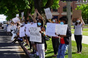 People protest against police brutality outside the Cache County Historic Courthouse on June 2, 2020.