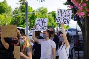 People protest against police brutality outside the Cache County Historic Courthouse on June 2, 2020.