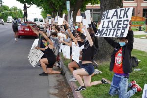 People protest against police brutality outside the Cache County Historic Courthouse.