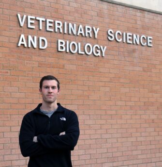 College of Veterinary Medicine sees first ever graduate Colton Nelson