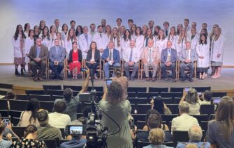 First class of veterinary medicine begins with white coat ceremony