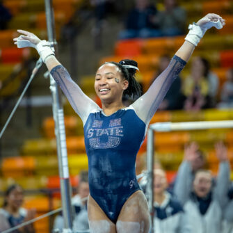 Gymnastics Shows Off in Blue and White Meet